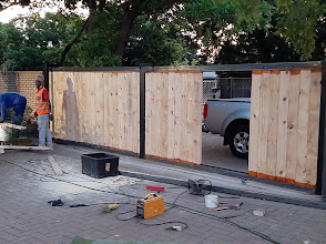 Automatic sliding gate motor installation