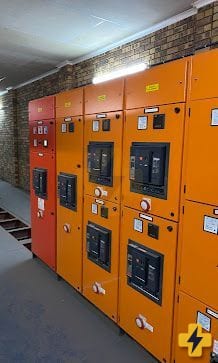 Orange industrial main switchgear panels